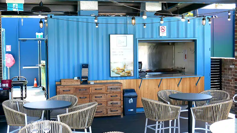 External lighting features in a Container Bar and Pizzeria